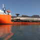 Illustration for article titled This Giant Russian Ship Is Toting Two Submarines